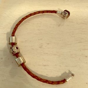 Pandora leather bracelet with two bumpers & charm